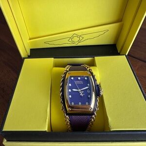 Invicta Gold and Purple Luxury Watch with Distinctive Design